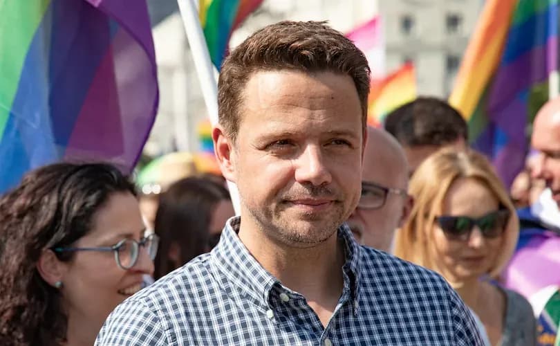 WATCH: Polish presidential candidate plants LGBT 'pride' flag on leftist opponent's podium