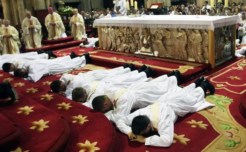 PHOTO: Boy lies face down to mirror priests during their ordination